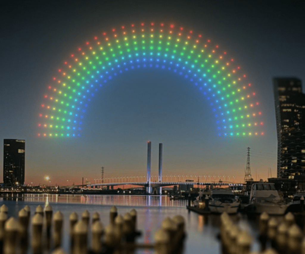 drones lighting up the summer nights over Victoria Harbour in a rainbow show