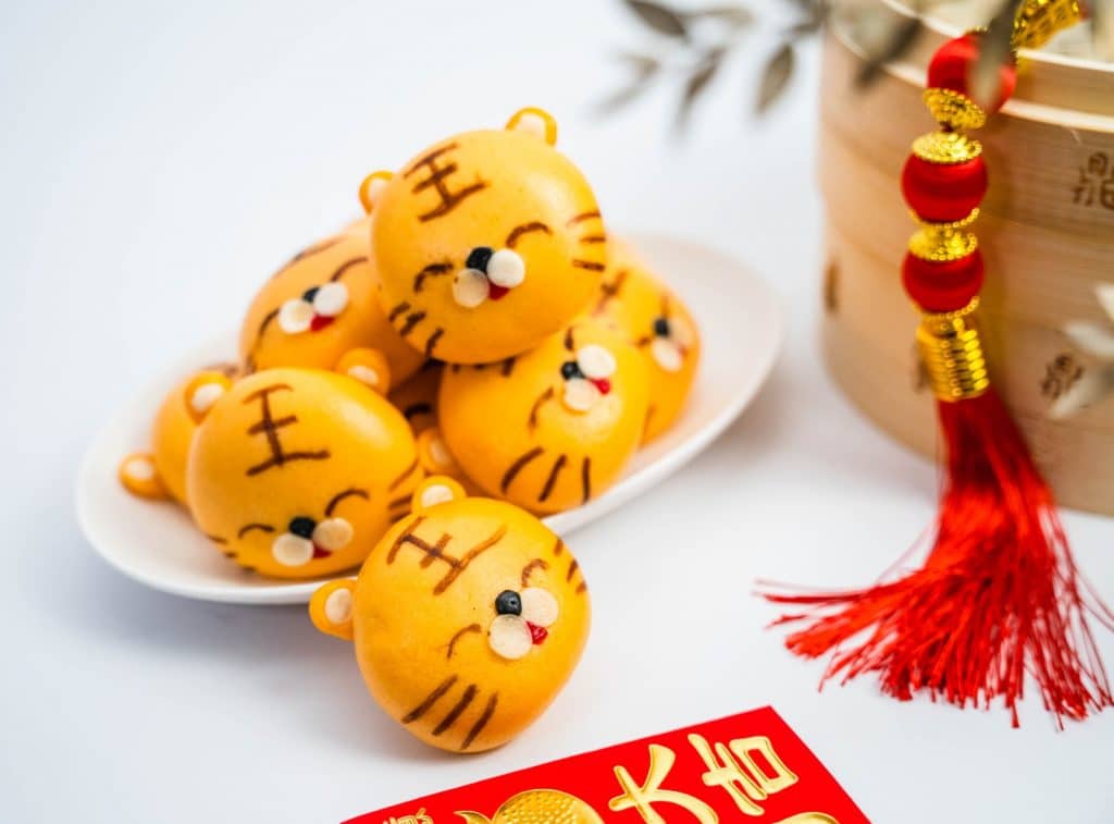 a pile of tiger buns on a plate