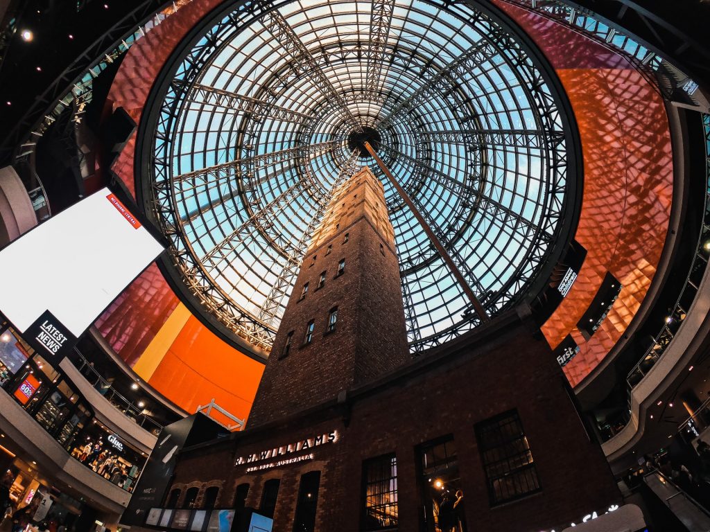 view from the ground floor of melbourne central looking up at the ceiling cone of the shot tower