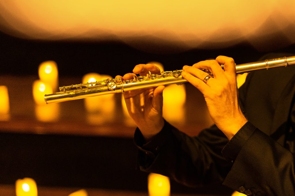 Clarinet player at a candlelight concert 