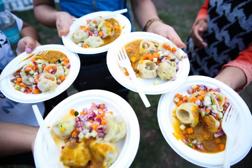 lots of different dumplings on plates from the Melbourne International Dumpling Festival