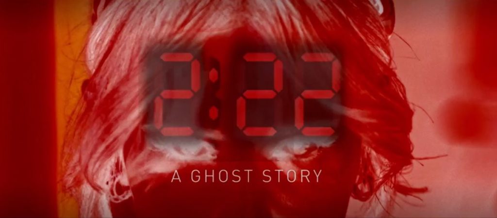 2:22 A Ghost Story written in red over a creepy image the top half of a woman's face