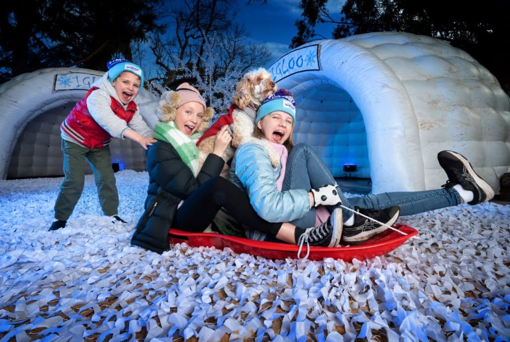 children on a sled at the Eynesbury Winter Festival
