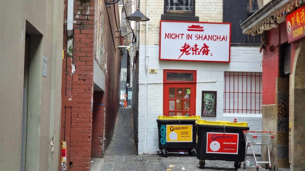 a view of Corrs Lane, one of the most narrow laneways in Melbourne, next to a Chinese restaurant