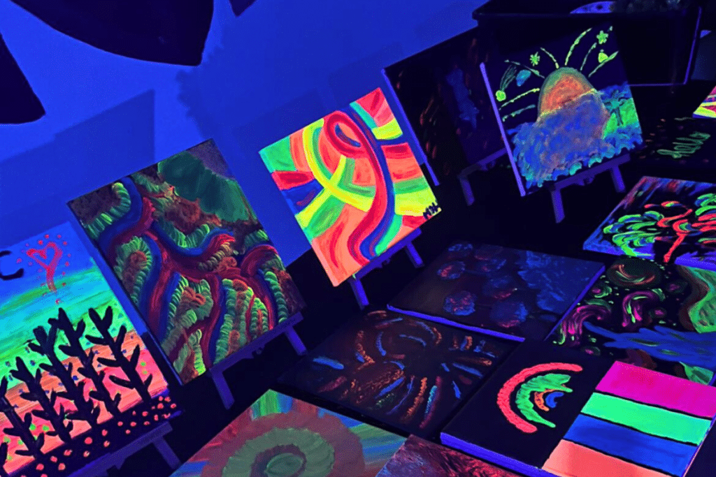 neon paintings at art & glow in the dark