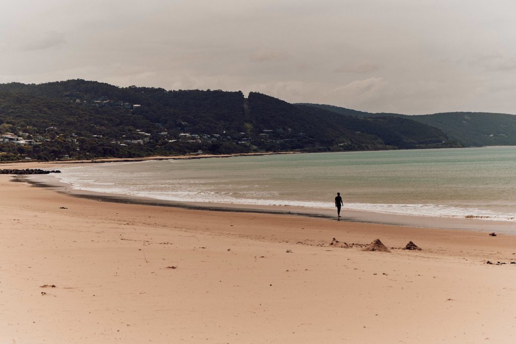 someone walking on the beach in Lorne