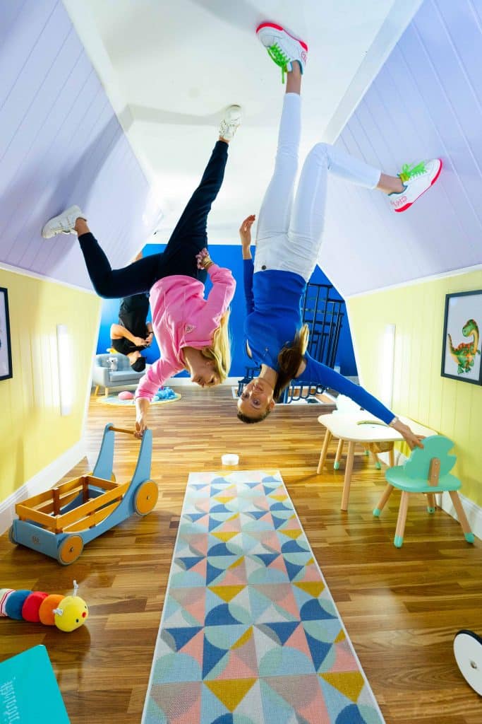 two people inside a children's room at House Down Under